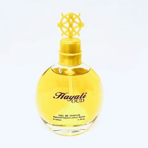yellow colored bottle on which it is written hayali oud on it