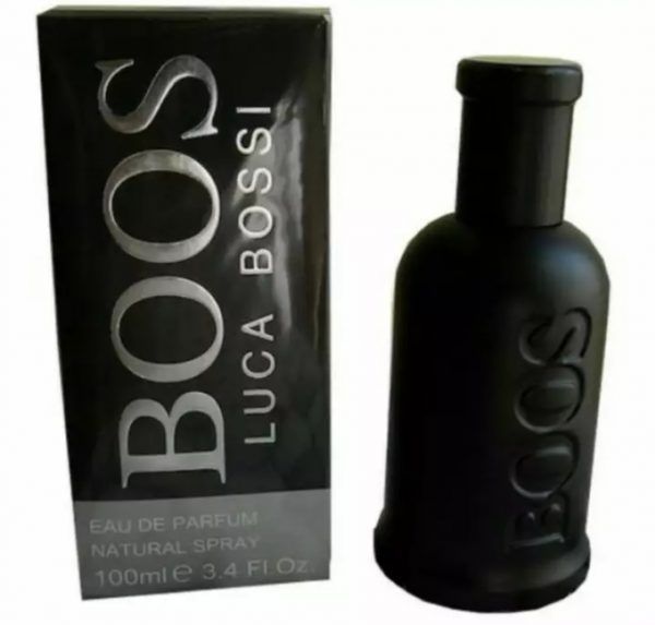 black coloured perfume bottle written boos luca boss on it