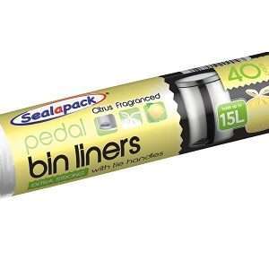 yellow colored roll on which bin liners is printed